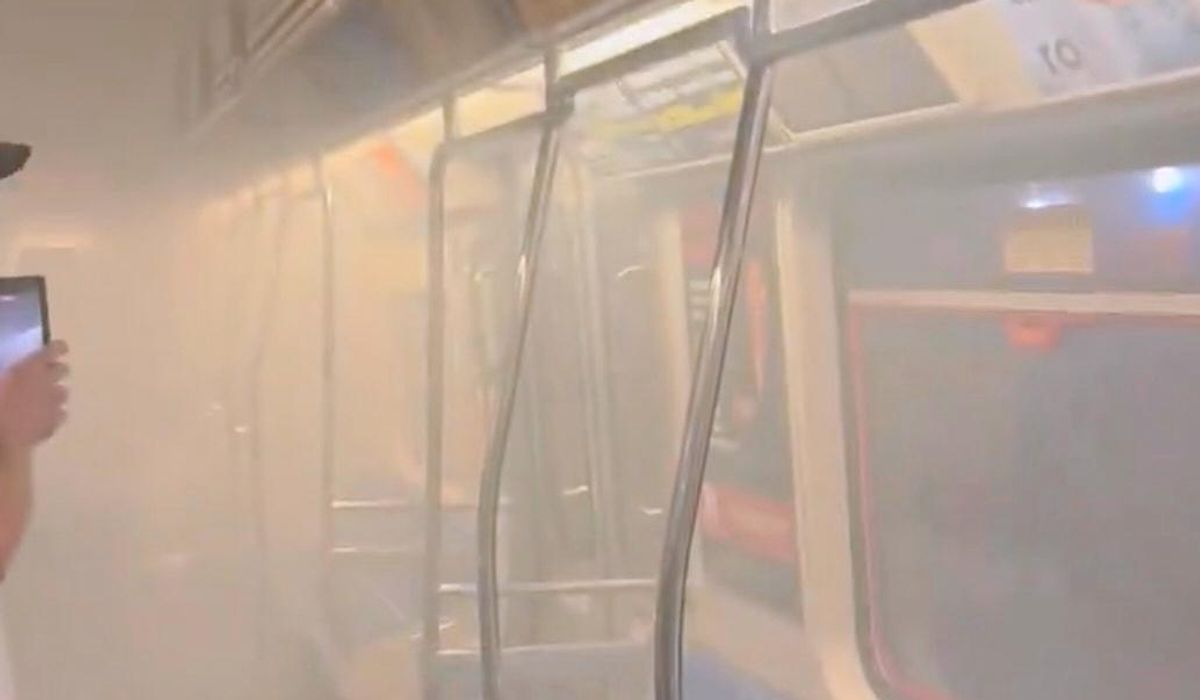 NextImg:Flames and smoke force passengers to flee New York City area commuter train