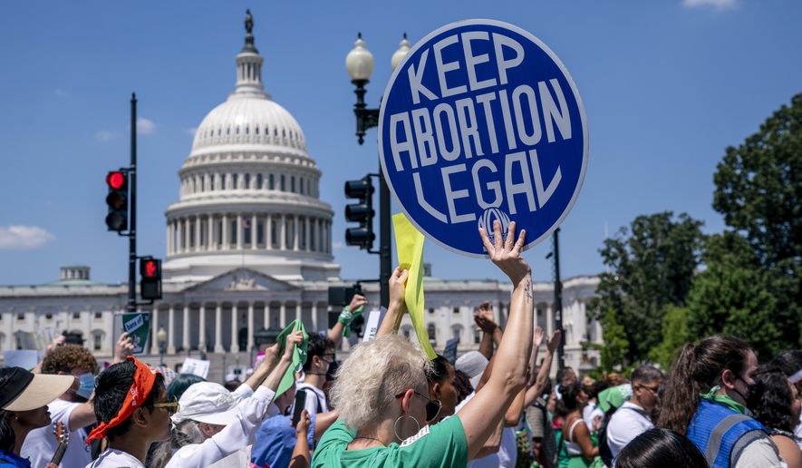 Abortion-rights activists demonstrate against the Supreme Court decision to overturn Roe v. Wade that established a constitutional right to abortion, on Capitol Hill in Washington, June 30, 2022. (AP Photo/J. Scott Applewhite) **FILE**