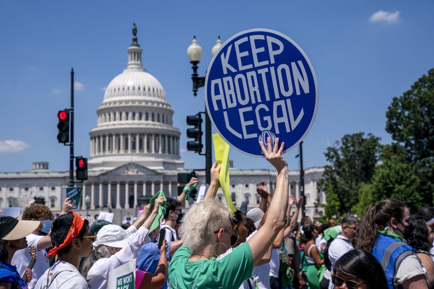 Abortion-rights activists demonstrate against the Supreme Court decision to overturn Roe v. Wade that established a constitutional right to abortion, on Capitol Hill in Washington, June 30, 2022. (AP Photo/J. Scott Applewhite) **FILE**