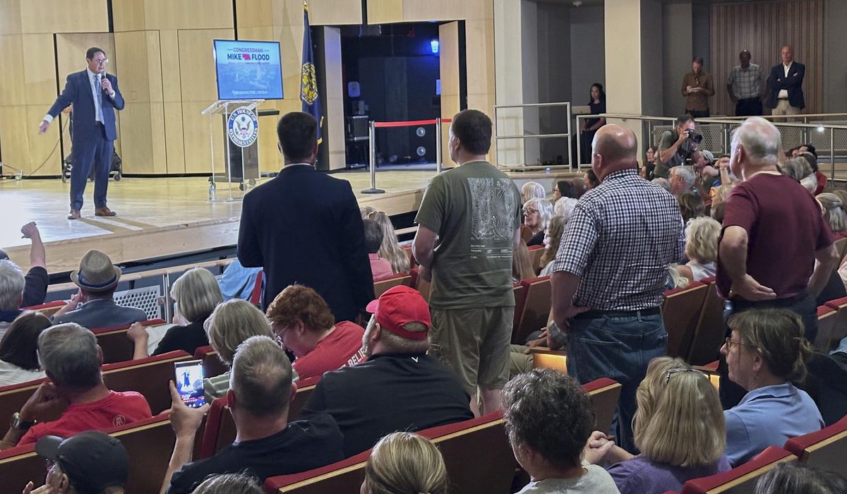 NextImg:Nebraska Republican is shouted down by hostile crowd at a town hall on Trump’s tax cuts