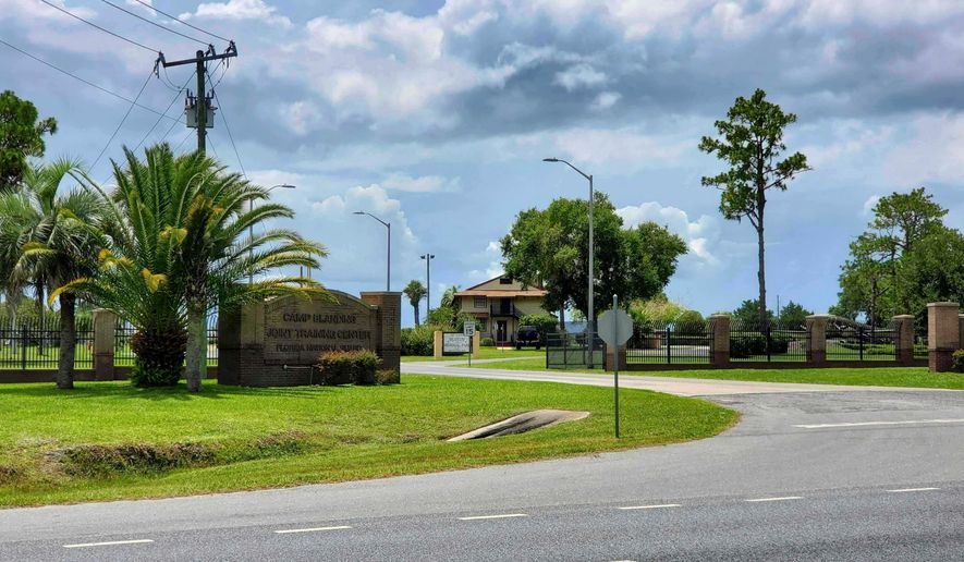 FILE - A sign marks the entrance to Camp Blanding Joint Training Center, a site used by the Florida National Guard, near Starke, Fla., July 15, 2025. (AP Photo/David Fischer, File)