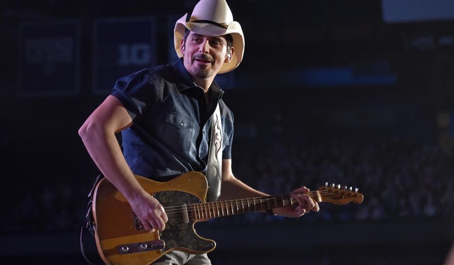 Brad Paisley performs in Rosemont, Ill., on Feb. 24, 2018. (Photo by Rob Grabowski/Invision/AP) **FILE**
