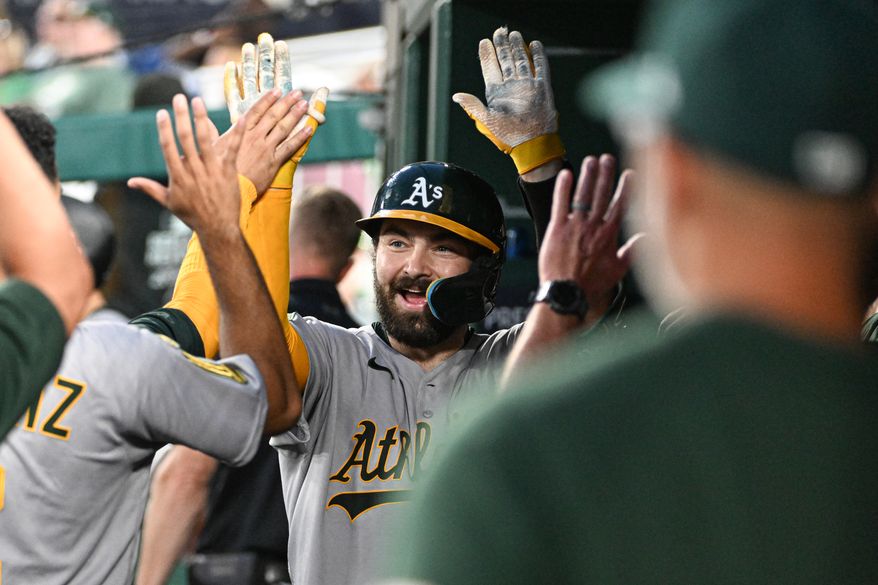 Athletics catcher Shea Langeliers (23) in the dugout after hitting a home run during the fifth inning of an MLB game against the Washington Nationals at Nationals Park in Washington D.C., August 5, 2025. (Photo by All-Pro Reels for Washingto\n Times Sports)