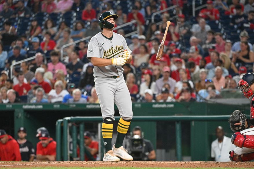 Athletics first baseman Nick Kurtz (16) tossing his bat after drawing a walk during the fifth inning of an MLB game against the Washington Nationals at Nationals Park in Washington D.C., August 5, 2025. (Photo by All-Pro Reels for Washingto\n Times Sports)
