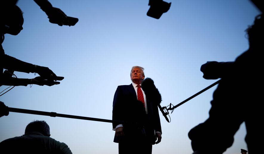 President Donald Trump speaks with reporters before boarding Air Force One at Lehigh Valley International Airport, in Allentown, Pa., Aug. 3, 2025. (AP Photo/Julia Demaree Nikhinson)