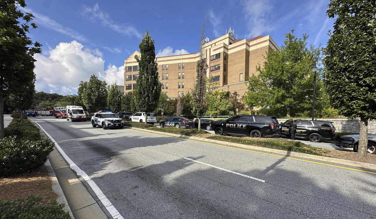 NextImg:Suspected shooter dead, police officer injured near CDC and Emory University: Police