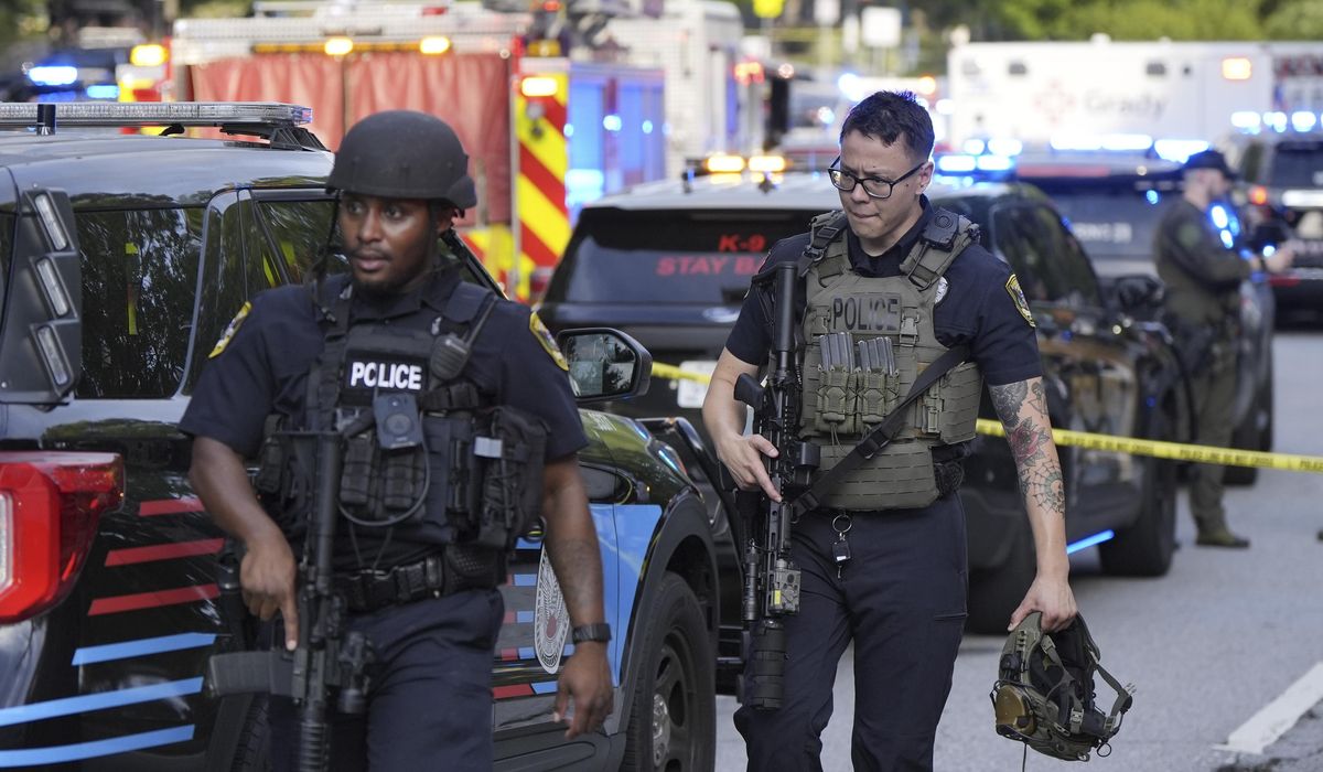 NextImg:Suspected gunman and police officer dead in shooting near the CDC and Emory University, police say