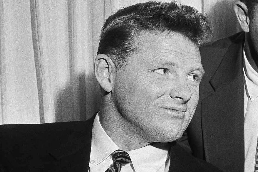 FILE - Billy Howton of the Green Bay Packers in Philadelphia, on Jan. 27, 1958, after a conference on the feasibility of a player pension plan. (AP Photo/Bill Ingraham)