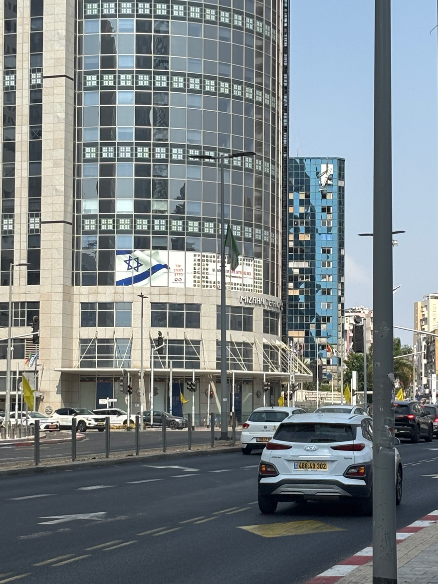 TEL AVIV — Scenes from Menachem Begin Road in Tel Aviv, an area hit by Iranian missiles in June, 2025. Windows are still missing on some of the buildings that were shaken by the missiles. August 9, 2025. Photo Credit: Cheryl Chumley / The Washington Times