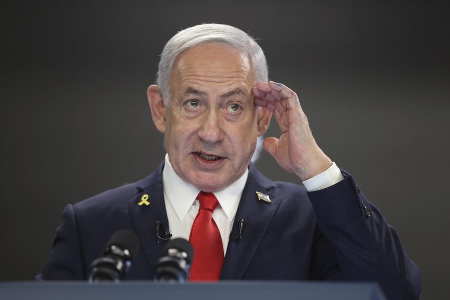 Israeli Prime Minister Benjamin Netanyahu speaks during a press conference at the Prime minister's office in Jerusalem, Sunday, Aug. 10, 2025. (Abir Sultan/Pool Photo via AP)