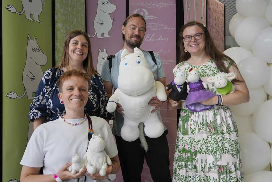 Finland Moomins Fans celebrate the 80th anniversary of the publication of the Finnish children's classic, "The Moomins and The Great Flood," and the birthday of the author Tove Jansson, in Tampere, Finland, Saturday, Aug. 9, 2025. (AP Photo/Tommi Ojala)