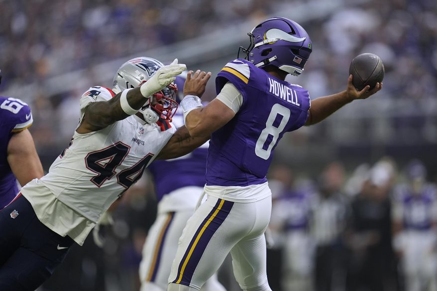 Minnesota Vikings quarterback Sam Howell (8) passes under pressure from New England Patriots linebacker K'Lavon Chaisson (44) during the first half of a preseason NFL football game Saturday, Aug. 16, 2025, in Minneapolis. (AP Photo/Abbie Parr)