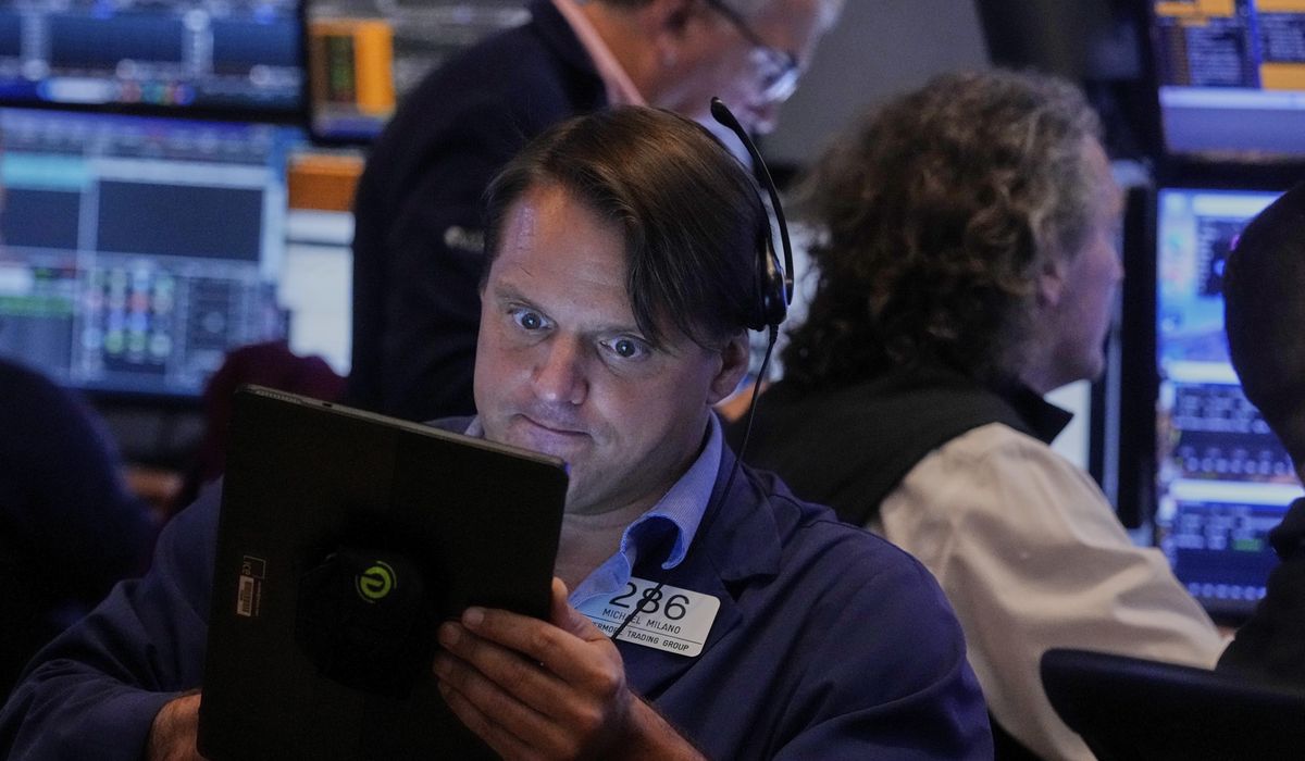 NextImg:Wall Street holds steady just below recent records
