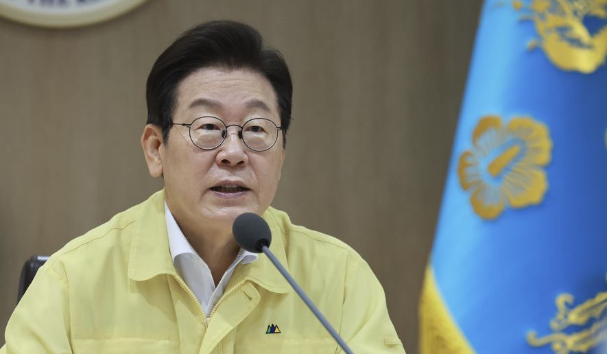 South Korean President Lee Jae-myung speaks during a Cabinet meeting at the presidential office in Seoul, South Korea, Monday, Aug. 18, 2025. (Hong Hae-in/Yonhap via AP)