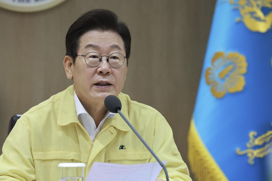 South Korean President Lee Jae-myung speaks during a Cabinet meeting at the presidential office in Seoul, South Korea, Monday, Aug. 18, 2025. (Hong Hae-in/Yonhap via AP)