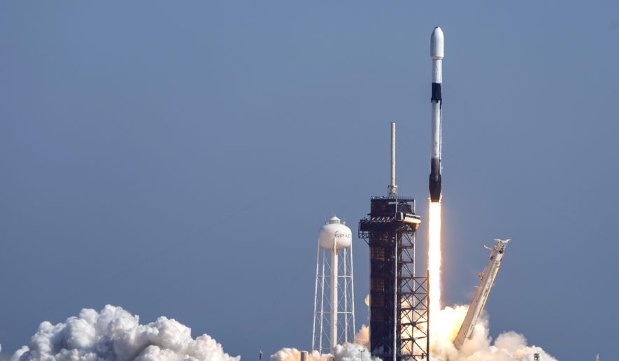 A SpaceX Falcon 9 rocket with a SXM-9 digital, audio radio satellite payload, lifts off from pad 39A at the Kennedy Space Center in Cape Canaveral, Fla., Dec. 5, 2024. (AP Photo/John Raoux, File)