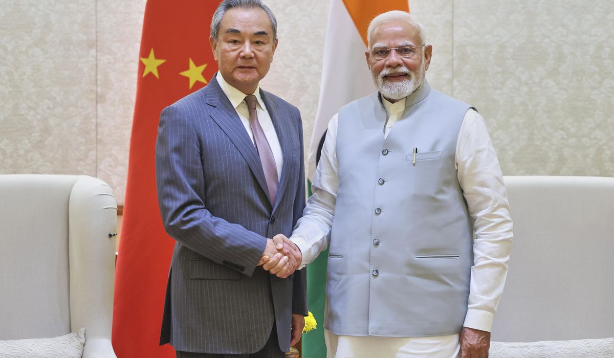 NextImg:Angered by America, India tilts toward China