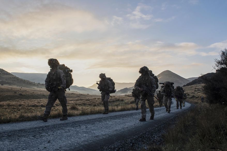 New Zealand army officer cadets move on exercise in the Waiouru training area in the central North Island of New Zealand, May 6, 2022. (Corporal Naomi James/NZDF via AP)