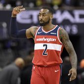 Washington Wizards guard John Wall gestures after hitting a 3-point basket during the second half of the team's NBA basketball game against the Brooklyn Nets, Saturday, Dec. 1, 2018, in Washington. (AP Photo/Nick Wass, File)