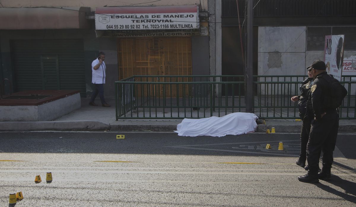 NextImg:Mexico City mayor says police have arrested 13 in connection with killings of her staffers