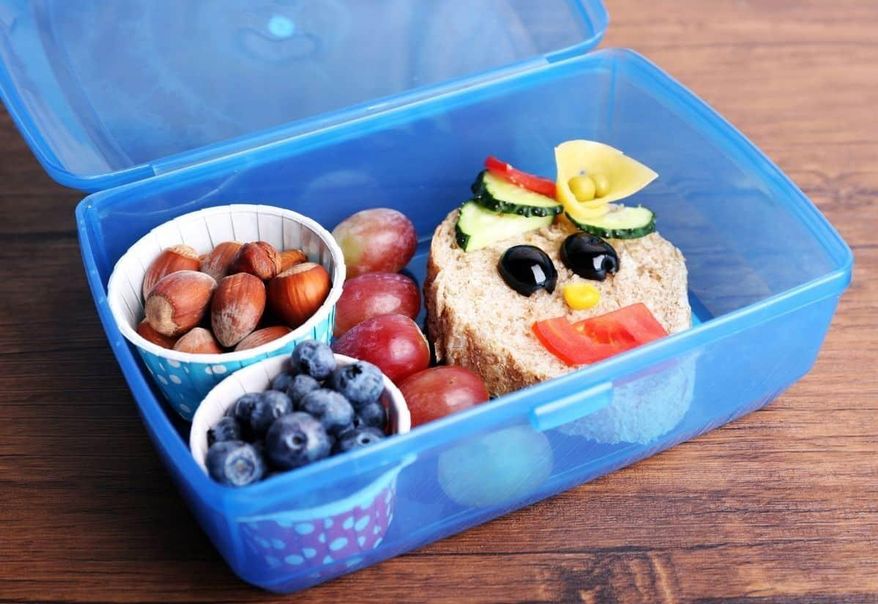 From star-cut fruit to cultural food swaps, lunchboxes reveal the pressures parents now carry. Photo credit: Depositphotos.