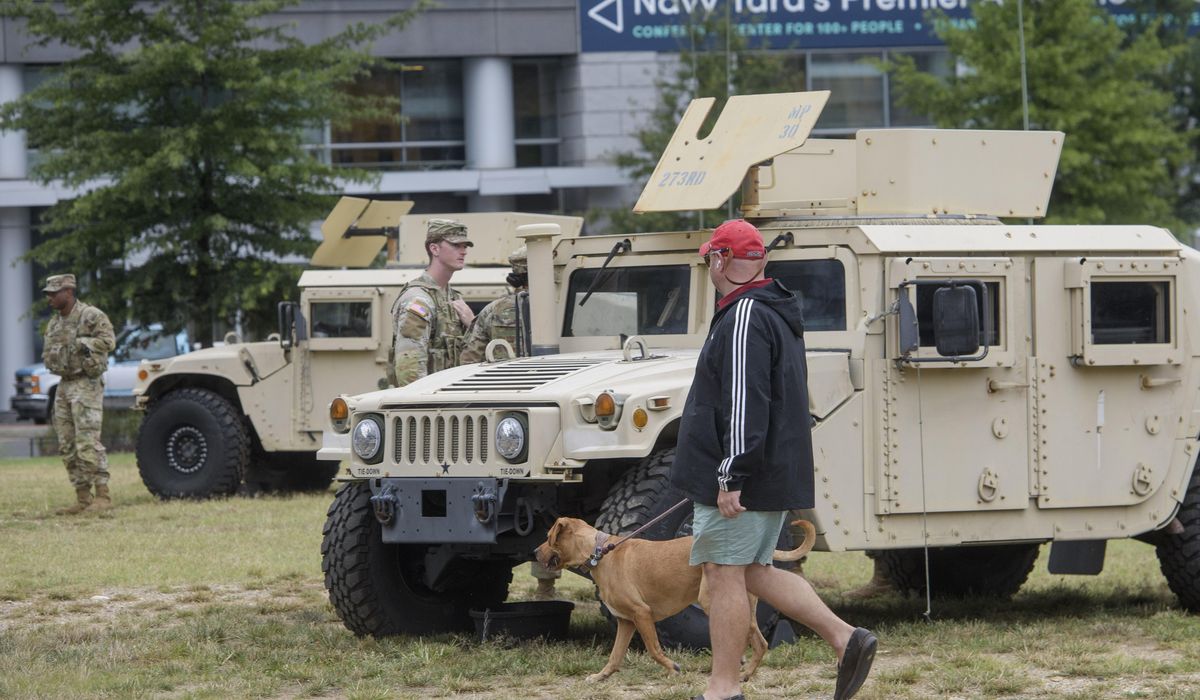 NextImg:D.C. National Guard vehicle hits car in Washington, driver hospitalized with minor injuries