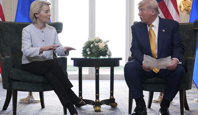 President Donald Trump and European Commission President Ursula von der Leyen talk after reaching a trade deal at the Trump Turnberry golf course in Turnberry, Scotland Sunday, July 27, 2025. (AP Photo/Jacquelyn Martin)