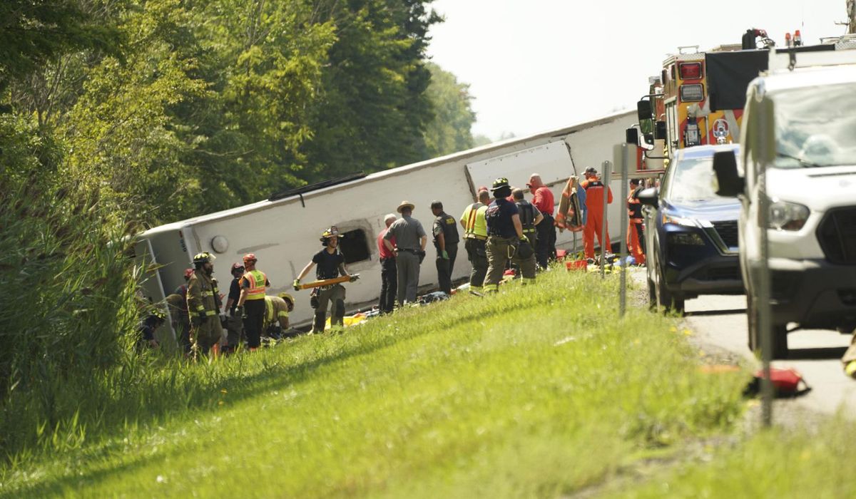 NextImg:Tour bus rollover kills 5 on interstate highway in western New York