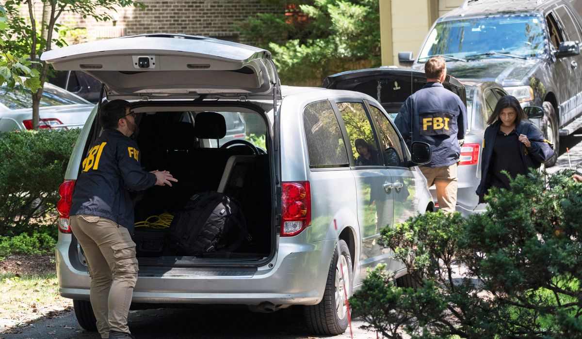NextImg:FBI seized phones, computer equipment, folders during search of Bolton’s home, records show
