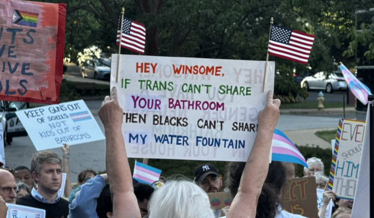 NextImg:Protester compares Earle-Sears’ bathroom stand to Jim Crow water fountains
