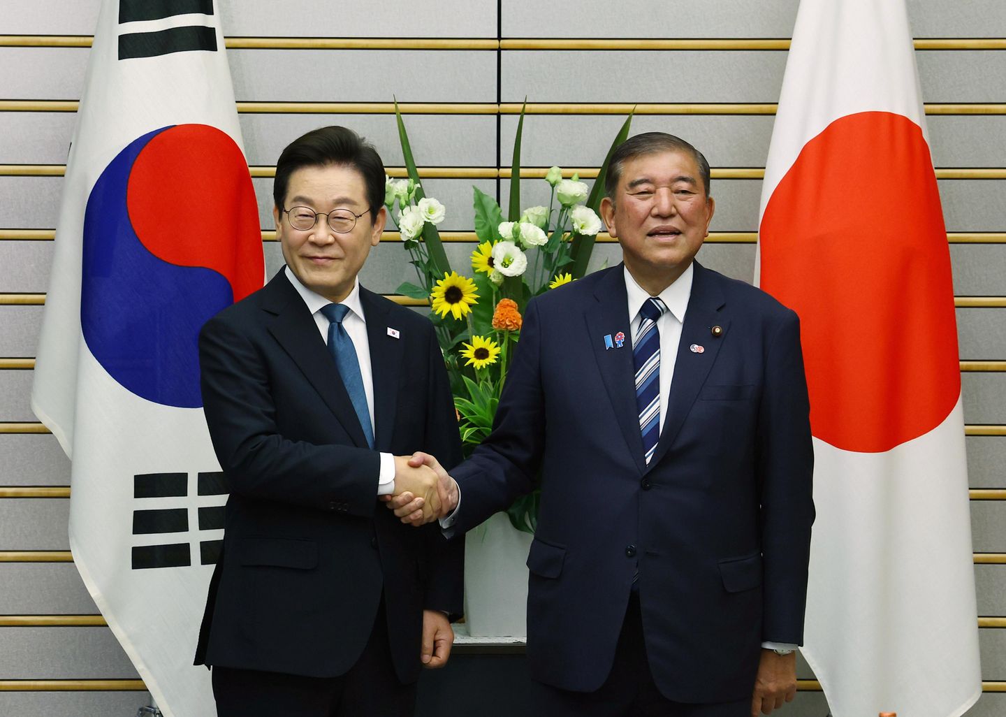 South Korea's president highlights friendly ties in Japan before key summit with Trump