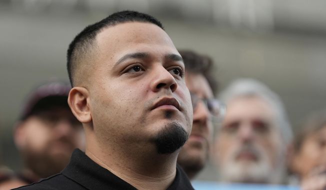 Kilmar Abrego Garcia attends a protest rally at the Immigration and Customs Enforcement field office in Baltimore, Monday, Aug. 25, 2025, to support Abrego Garcia. (AP Photo/Stephanie Scarbrough)