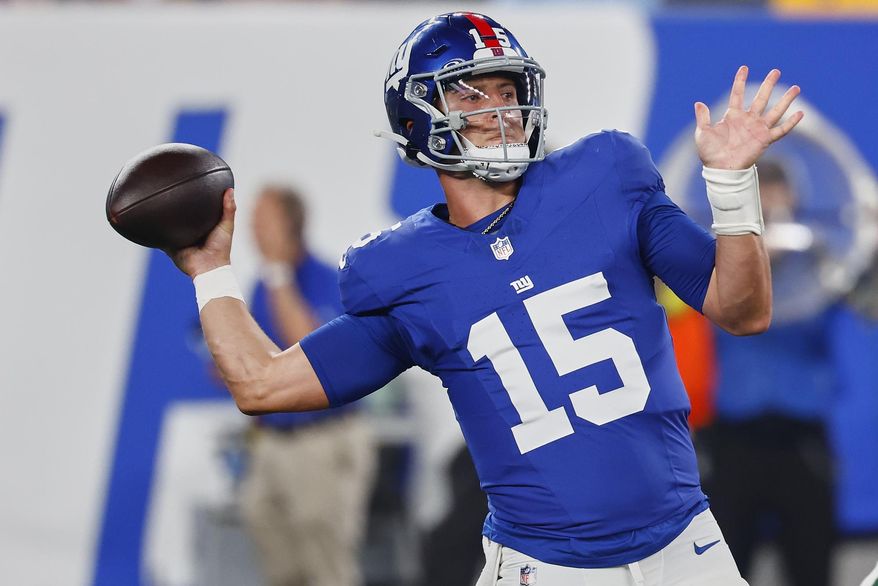 New York Giants quarterback Tommy DeVito (15) passes against the New York Jets during the fourth quarter of an NFL football game, Saturday, Aug. 16, 2025, in East Rutherford, N.J. (AP Photo/Noah K. Murray)