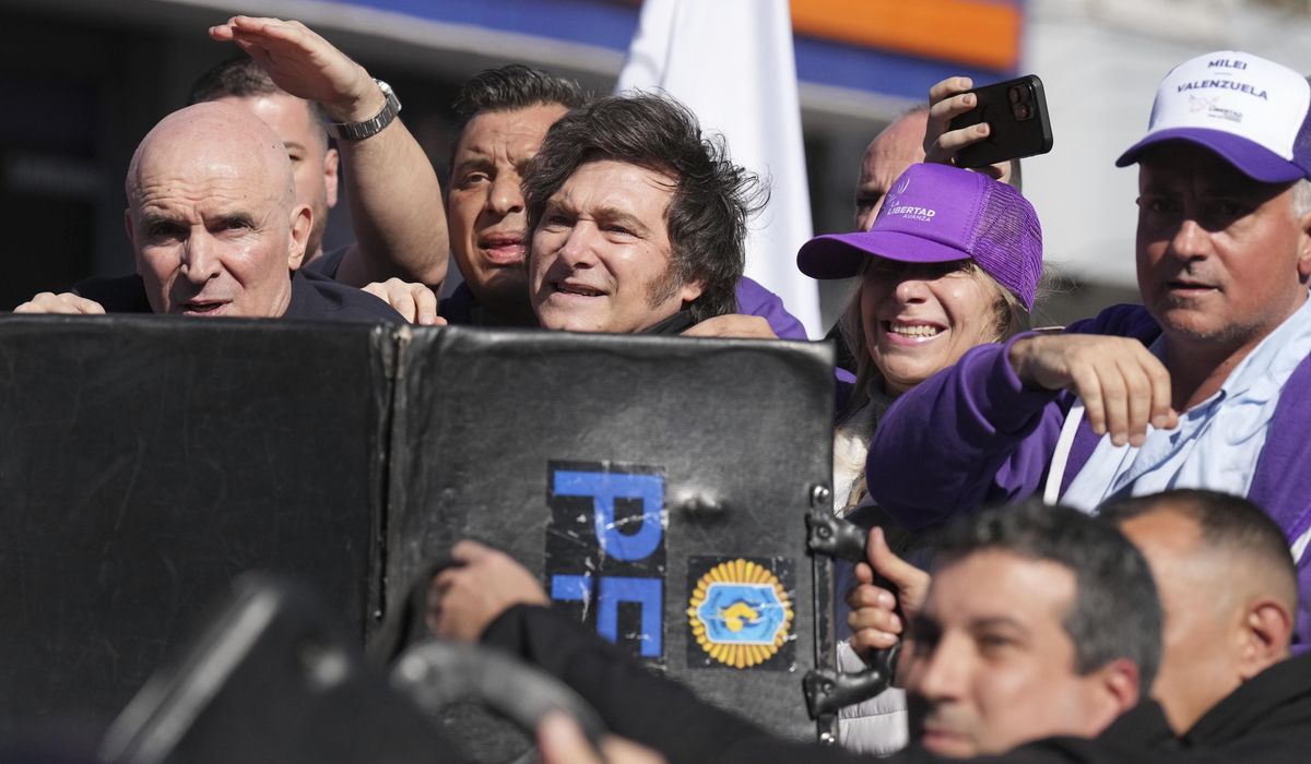 NextImg:Protesters throw rocks at Argentine President Milei’s convoy while he campaigns