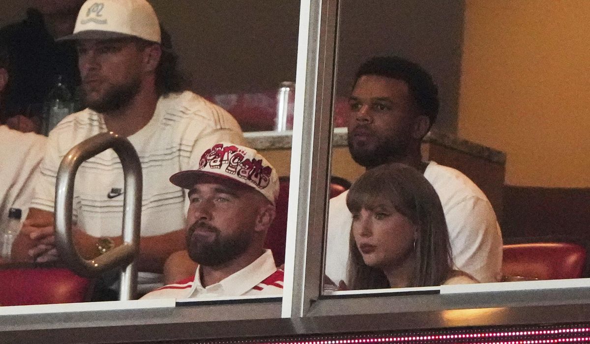 NextImg:Travis Kelce and Taylor Swift attend Nebraska-Cincinnati game after engagement