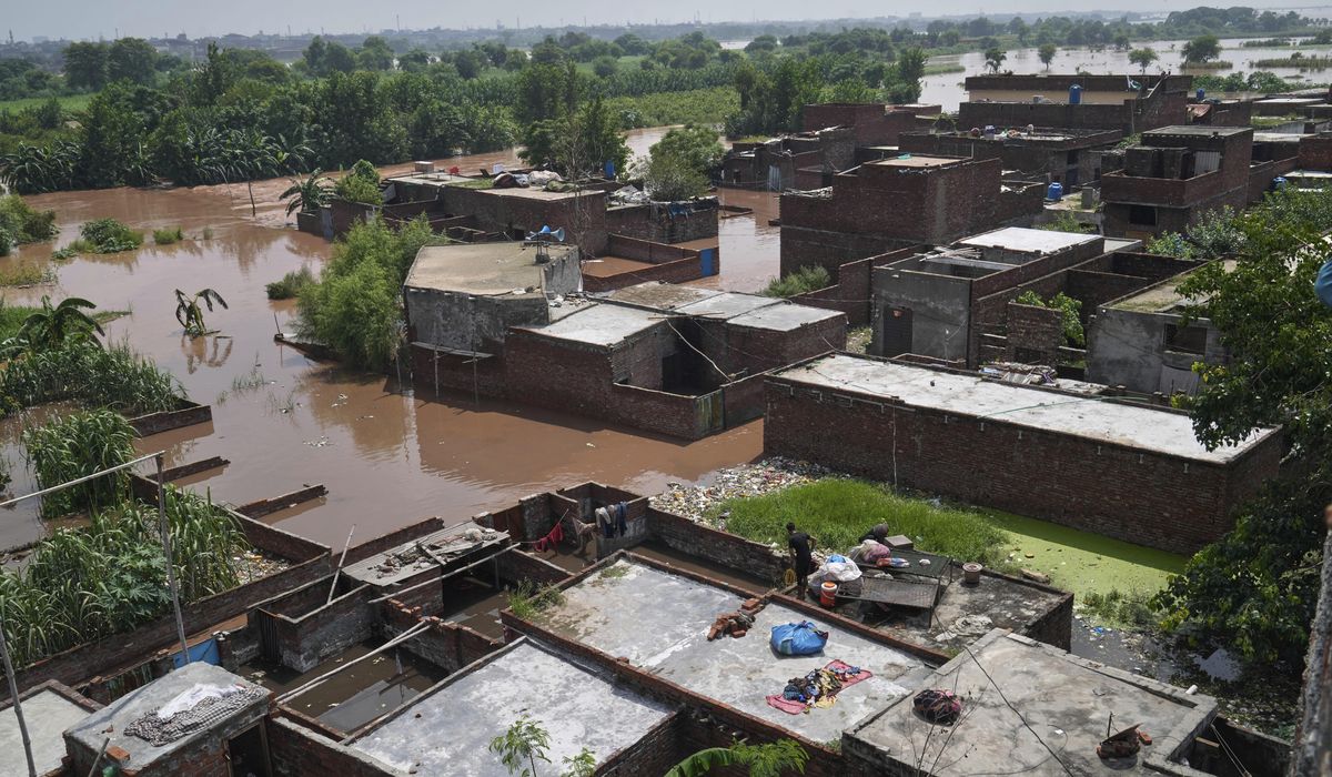 NextImg:Floods displace nearly 250,000 people and affect 1.2 million in eastern Pakistan