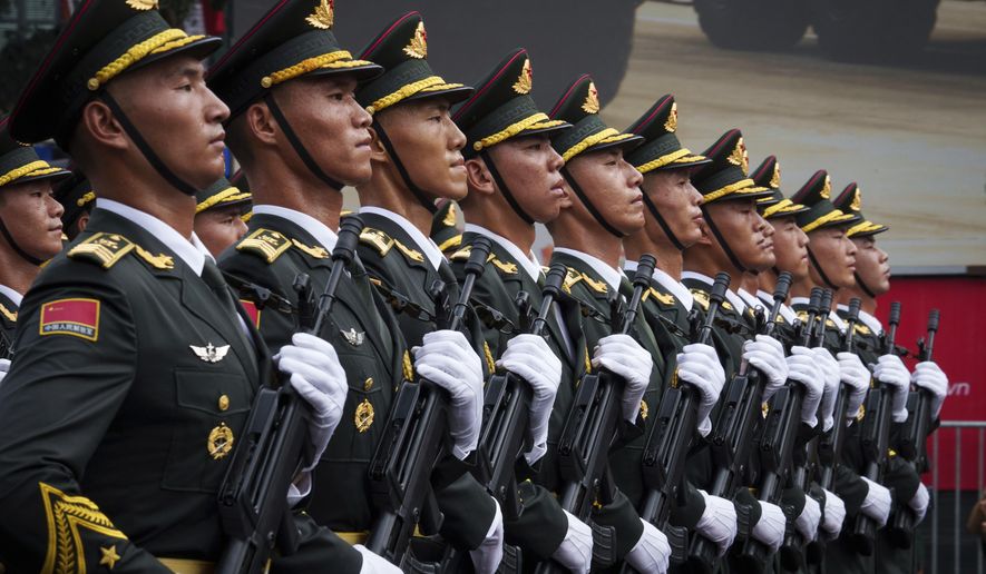 People's Liberation Army of China march during a military parade rehearsal for Vietnam's 80th National Day celebration in Hanoi, Vietnam, Saturday, Aug. 30, 2025. (AP Photo/Vincent Thian)