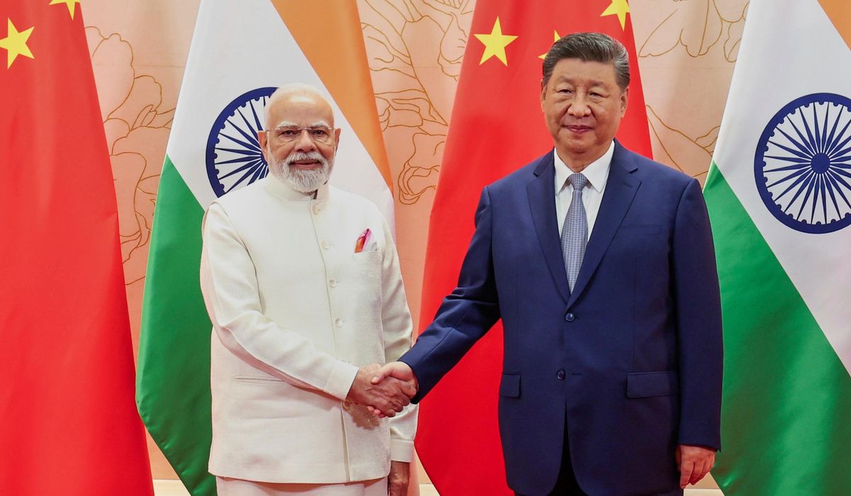 NextImg:China’s Xi and India’s Modi vow to resolve border differences at a meeting in Tianjin