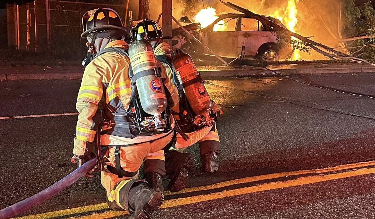 NextImg:Army football player pulls man from crashed car before it catches fire