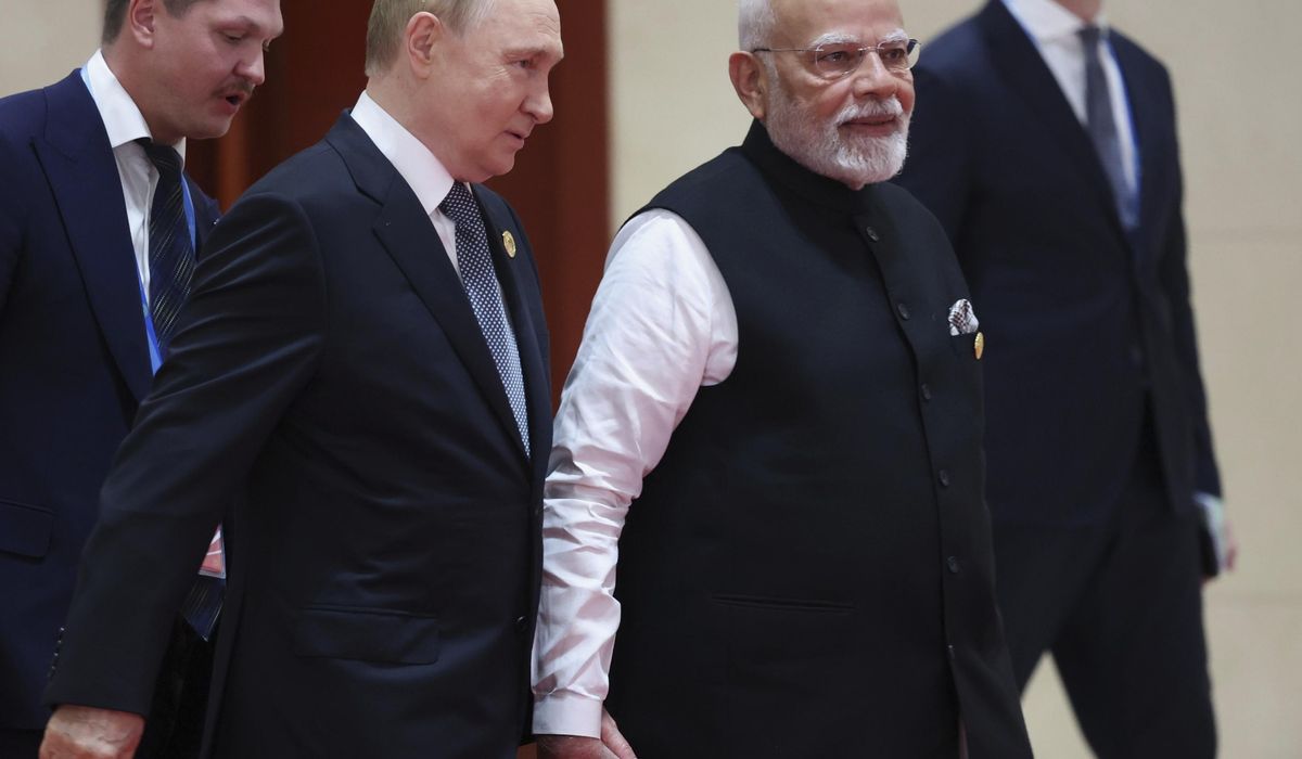 NextImg:Modi, Putin affirm special relationship as India faces steep U.S. tariffs over Russian oil imports