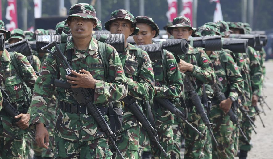 Indonesian soldiers are deployed following days of violent protests against lawmakers’ perks and privileges, in Jakarta, Indonesia, Monday, Sept. 1, 2025. (AP Photo/Tatan Syuflana)