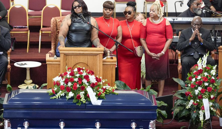 FILE - DeAsia Harmon speaks at the funeral for her husband D'Vontaye Mitchell, July 11, 2024, in Milwaukee. Mitchell died June 30 after an incident at a hotel. (AP Photo/Morry Gash, file)