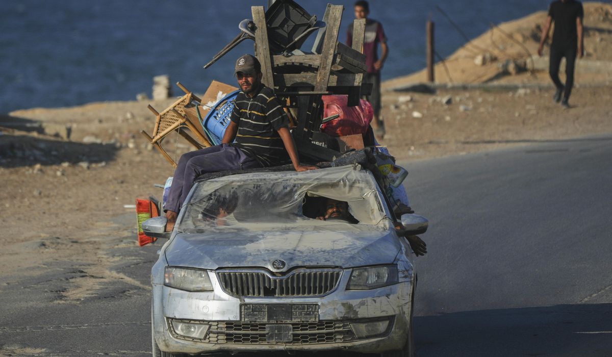 NextImg:Israel calls on famine-stricken residents to flee and targets more high-rises in Gaza City