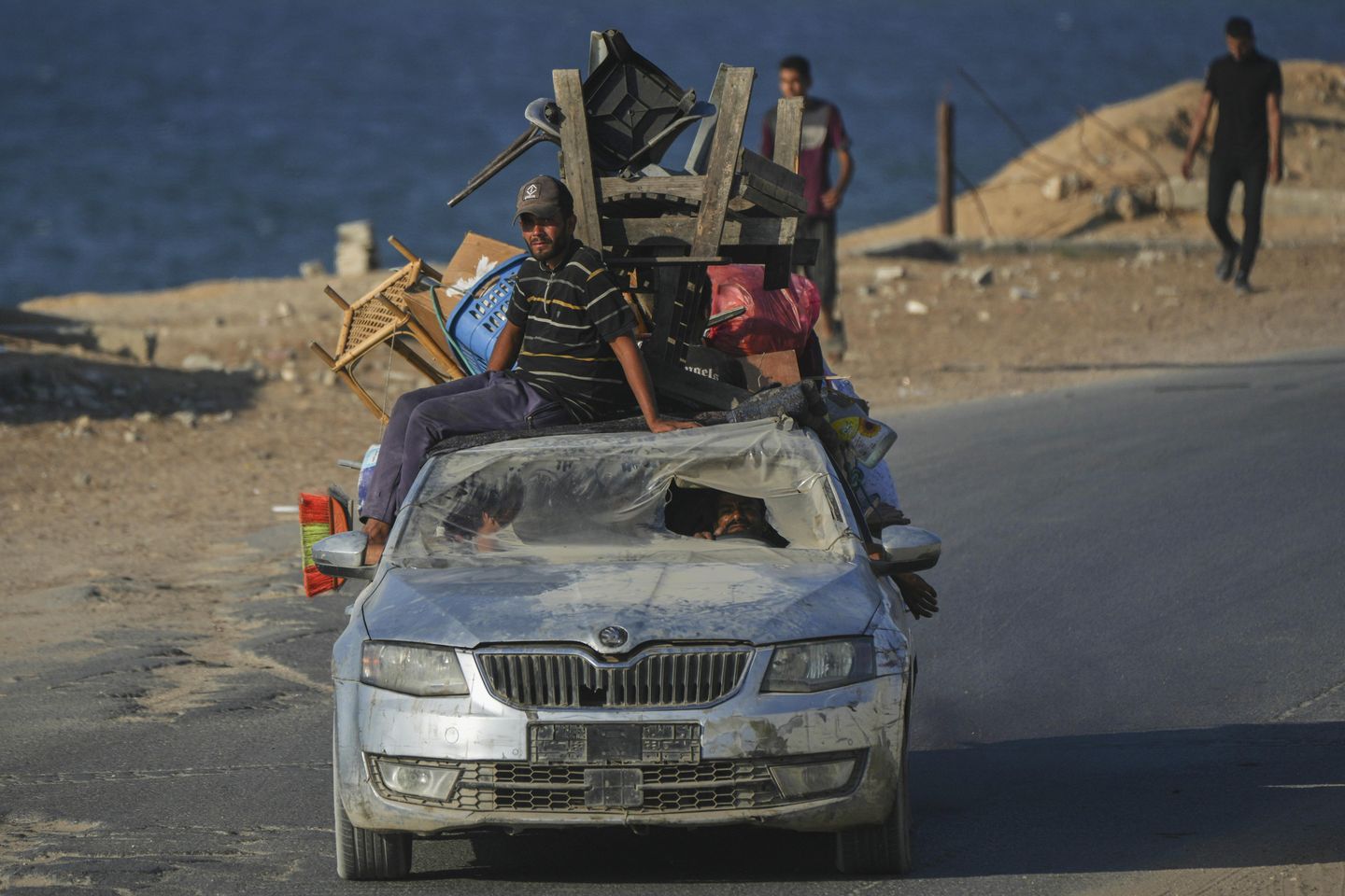 Israel calls on famine-stricken residents to flee and targets more high-rises in Gaza City