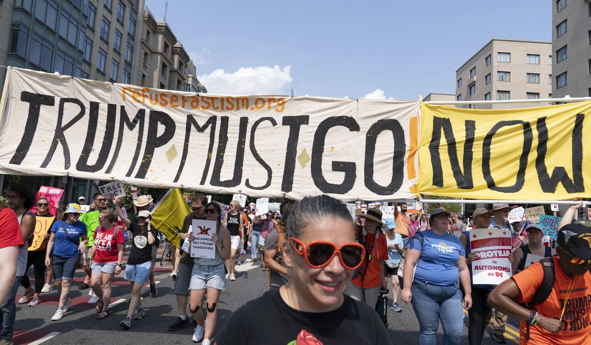 NextImg:Thousands protest for a ‘Free DC’ on the fourth week of federal control in Washington