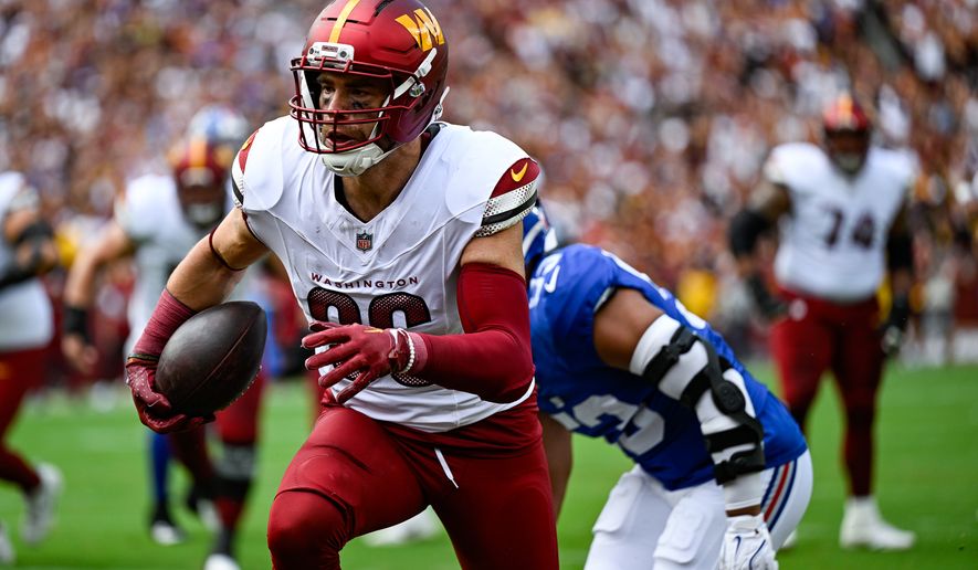 Washington Commanders tight end Zach Ertz (86) catches his first touchdown pass of the season during the first quarter against the New York Giants at Northwest Stadium in Landover, Maryland, September 7, 2025. (Photo by Brian Murphy for the Washington Times)