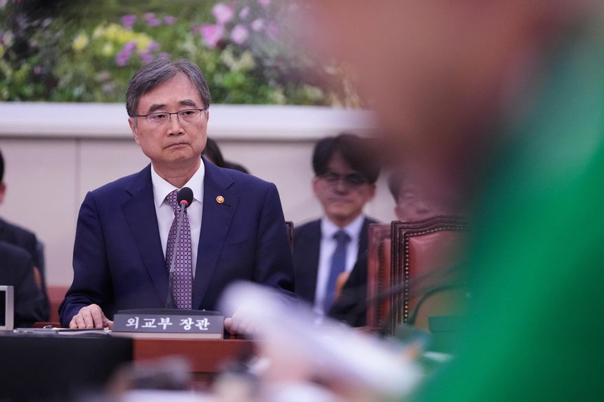 South Korean Foreign Minister Cho Hyun listens to lawmaker's question during a session of the Foreign Affairs and Unification Committee at the National Assembly in Seoul, South Korea, Monday, Sept. 8, 2025. (AP Photo/Lee Jin-man)