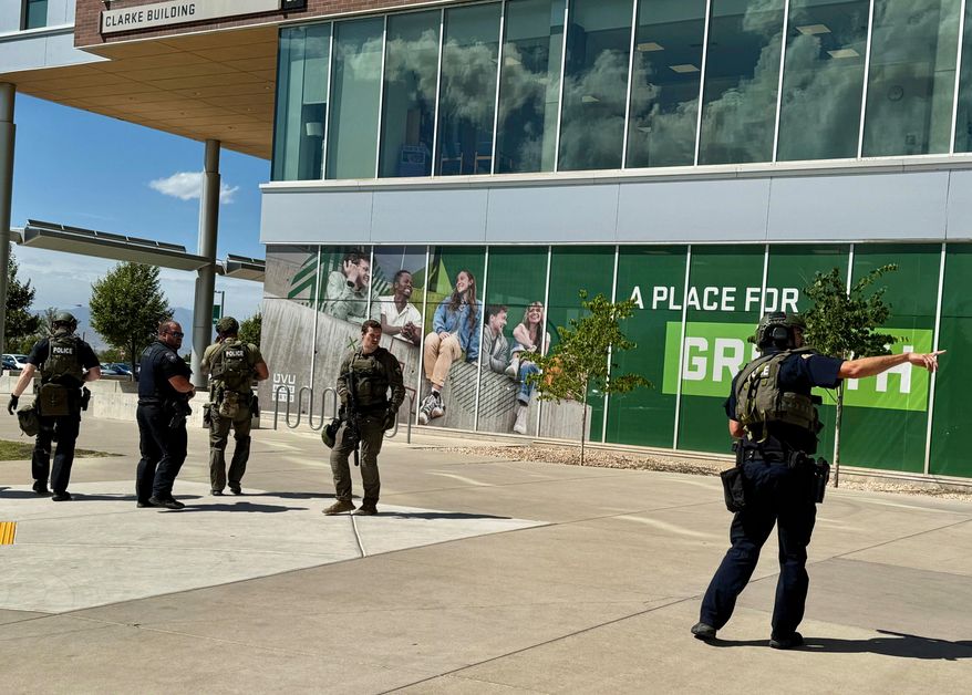 Police work on the campus after Charlie Kirk was shot during Turning Point's visit to Utah Valley University in Orem, Utah, Wednesday, Sept. 10, 2025. (AP Photo/Hannah Schoenbaum)