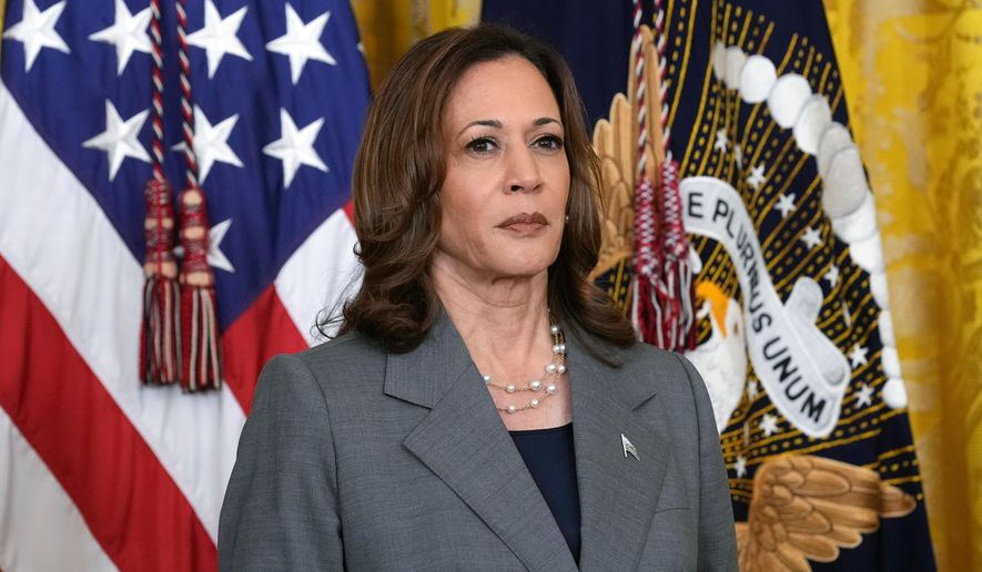 Vice President Kamala Harris listens during an event with President Joe Biden in the East Room of the White House in Washington, Sept. 26, 2024. (AP Photo/Susan Walsh, File)