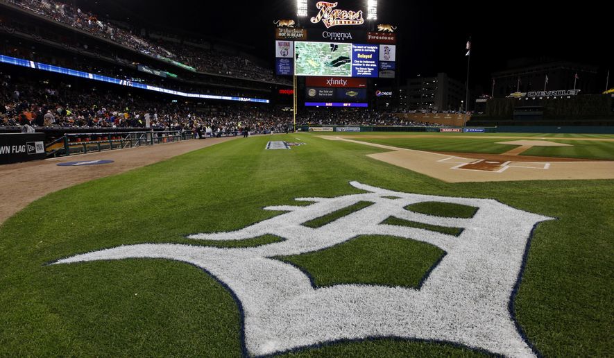 The Detroit Tigers logo is seen during a rain delay at Game 4 of the American League championship series against the New York Yankees Wednesday, Oct. 17, 2012, in Detroit. (AP Photo/Paul Sancya, File)
